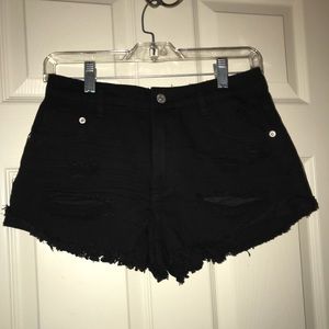 Black ripped shorts